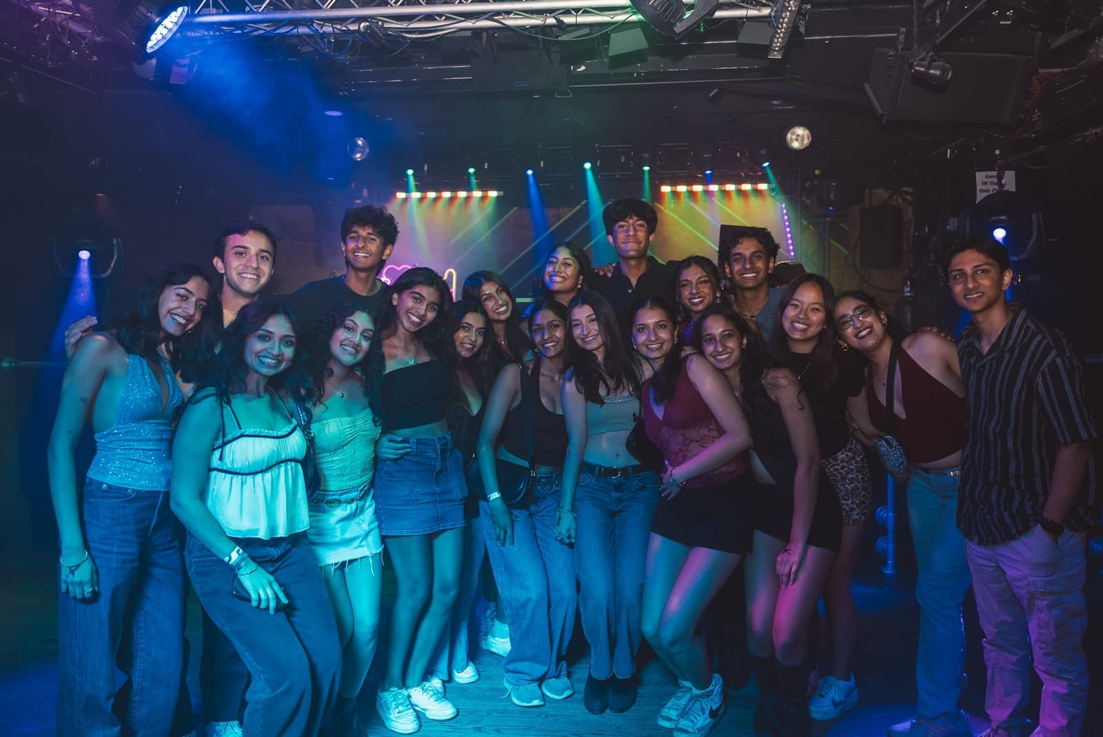 A wide view of students gathered together at a packed campus event